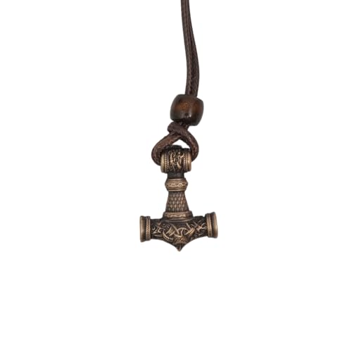 A Brass cast Viking Hammer Pendant with intricate Norse designs hangs from a dark cord accented by a wooden bead, displayed against a white background.