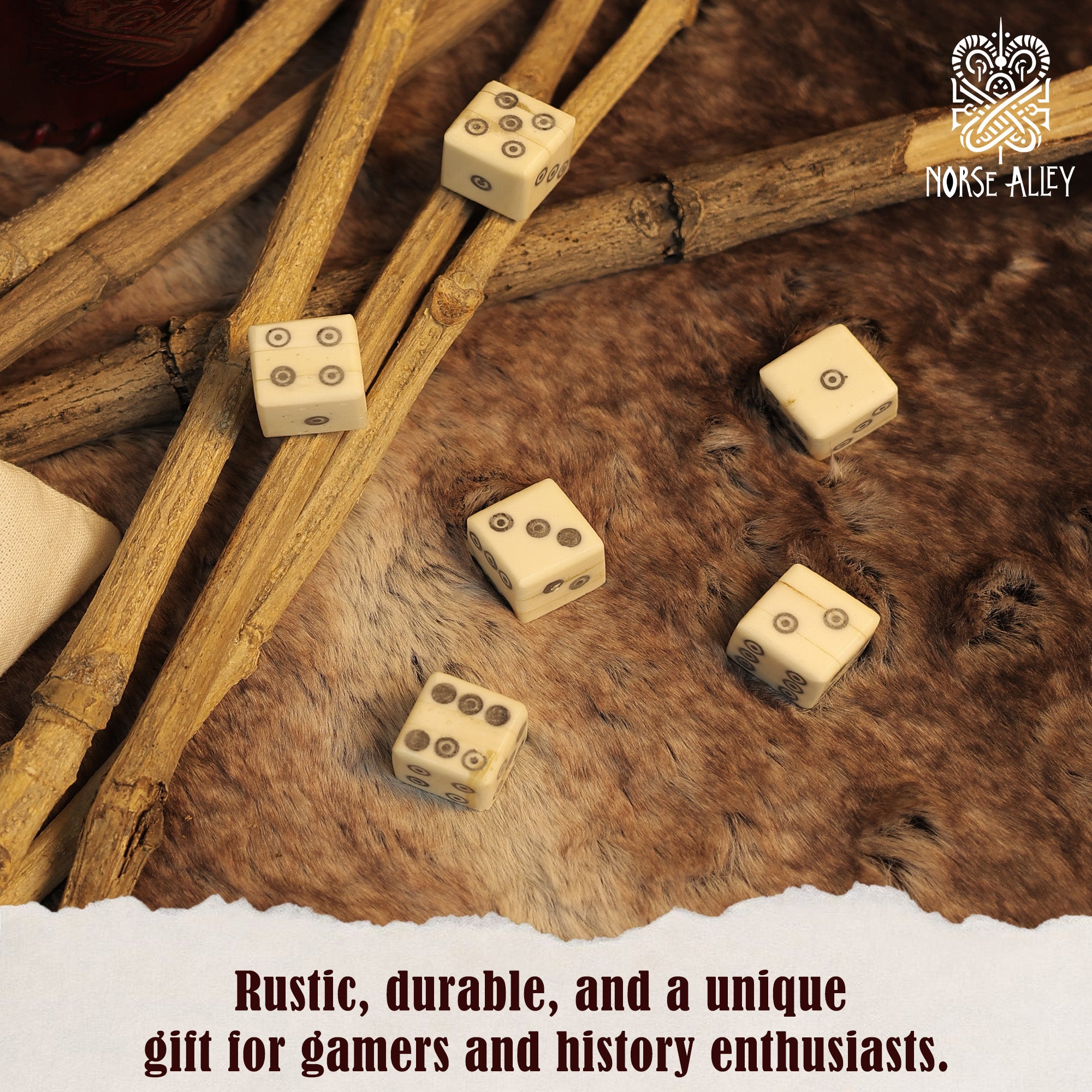 Six ivory bone dice with black pips from the Bone Dice – Set of 6 Viking Style 6-Sided Dice rest on fur, surrounded by wooden sticks. Rustic, durable, and a unique gift for gamers and history fans. Norse Alley logo shown top right.