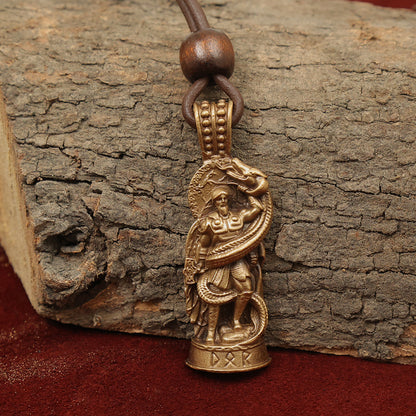 The Thor Serpent Pendant – The Thunder God features a brass warrior with shield and serpent, hanging from a leather cord with a wooden bead—an eye-catching tribute to Norse mythology.