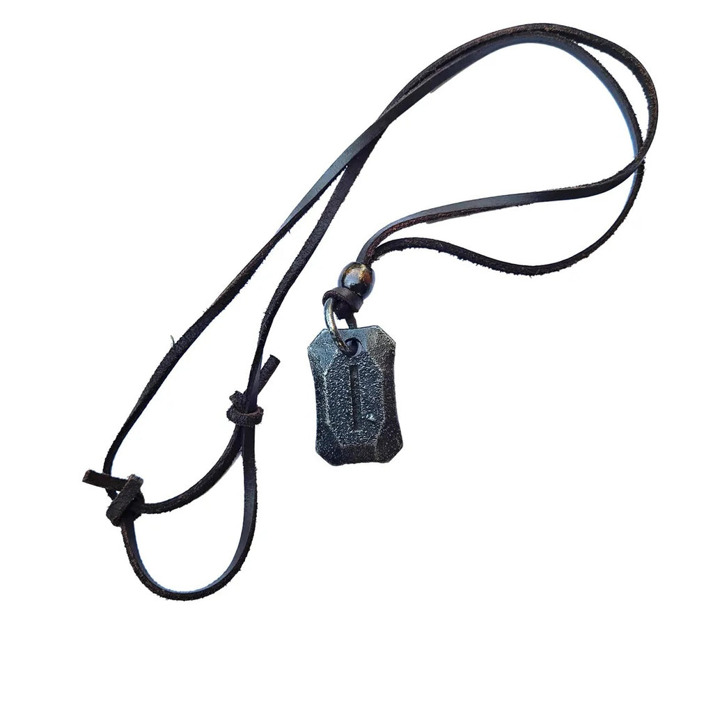 The Viking Rune Pendant Isa features a faceted black stone on a black leather cord with an adjustable knot, inspired by Norse mythology.