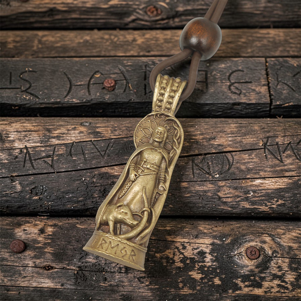 The Freyr Pendant – Lord of Abundance shows a robed figure with a wolf, standing on rune-etched wooden planks. "FENRIR" is engraved at the base. This Norse jewelry hangs from a leather cord adorned with a wooden bead.